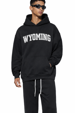 Wyoming State Pride Hoodie in Black / White — lifestyle 1