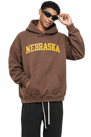 Nebraska State Pride Hoodie in Brown / Cream — lifestyle 1