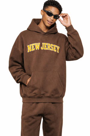 New Jersey State Pride Hoodie in Brown / Gold — lifestyle 1