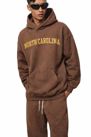 North Carolina State Pride Hoodie in Brown / Cream — lifestyle 2