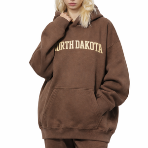 North Dakota State Pride Hoodie in Brown / Cream — lifestyle 2