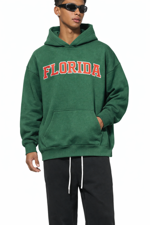 Florida State Pride Hoodie in Eden Green / Pink — lifestyle 1