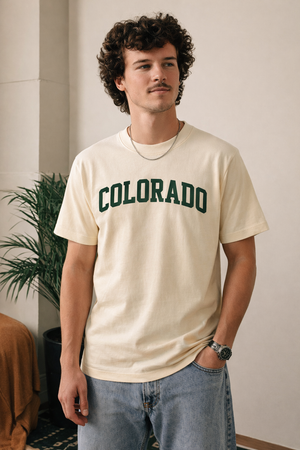 Colorado State Pride T-Shirt in Cream / Forest Green — lifestyle 1