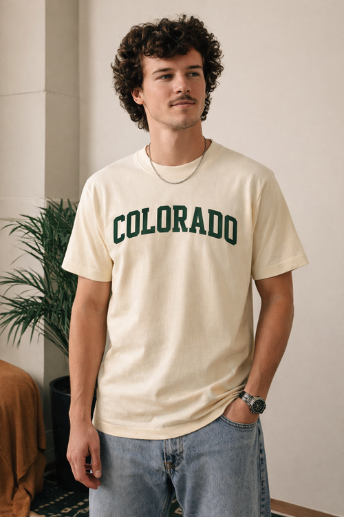 Colorado State Pride T-Shirt in Cream / Forest Green — lifestyle 1