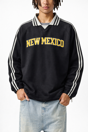 New Mexico College Varsity Sweatshirt in Black / Yellow — lifestyle 1