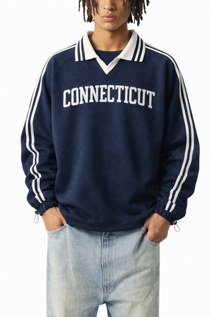 Connecticut College Varsity Sweatshirt in Royal Blue / White — lifestyle 1