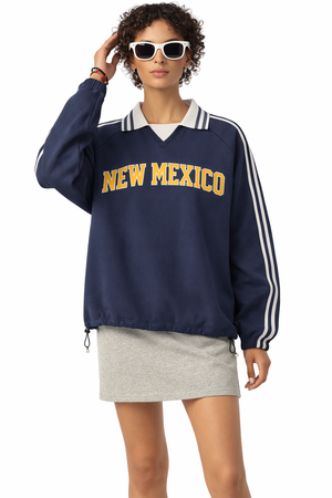 New Mexico College Varsity Sweatshirt in Royal Blue / Yellow — lifestyle 1