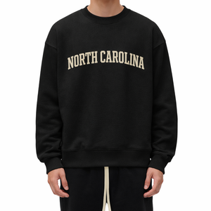 North Carolina Crewneck Sweatshirt in Black / White — lifestyle 1