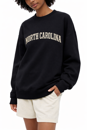 North Carolina Crewneck Sweatshirt in Black / White — lifestyle 2