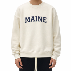 Maine Crewneck Sweatshirt in Cream / Navy — lifestyle 1