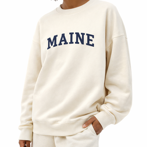 Maine Crewneck Sweatshirt in Cream / Navy — lifestyle 2