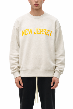 New Jersey Crewneck Sweatshirt in Cream / Gold — lifestyle 1