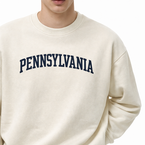 Pennsylvania Crewneck Sweatshirt in Cream / Navy — lifestyle 1
