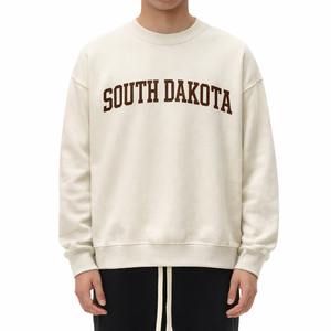 South Dakota Crewneck Sweatshirt in Cream / Brown — lifestyle 1