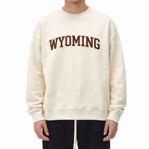 Wyoming Crewneck Sweatshirt in Cream / Brown — lifestyle 1